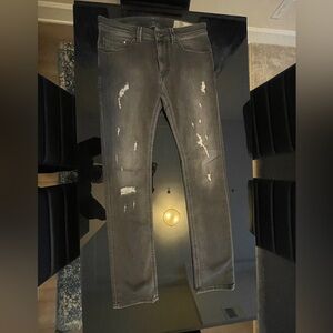 Sleek pair of Diesel black slim jeans in excellent condition